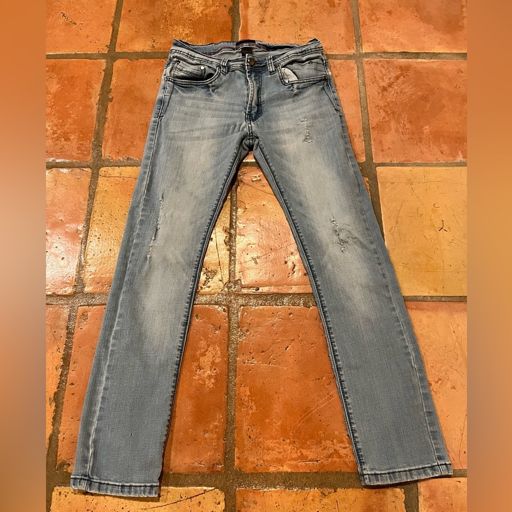 30x30 distressed, skinny fit Steve’s Jeans
